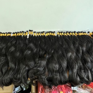 Vente en gros de cheveux humains vierges vietnamiens alignés avec de longues cuticules style noir ondulé naturel en vrac - Product Image 1