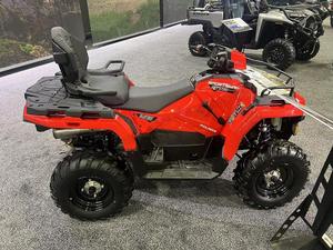 Red Plastic ATV Utility Vehicle with Black Seat and Cargo Rack for All Seasons Outdoor Use - Product Image 2