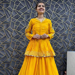 Haute qualité jaune Kedyu Lehenga ensemble en Chinon fil séquence travail traditionnel Navtarti vêtements de mariage pour les fêtes - Product Image 1