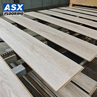 Plancher stratifié PVC gaufré hybride imperméable Classe 32 Classe 33 pour zones à fort trafic