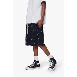 Shorts amples en molleton 100 % coton teint en pièce avec boutons sur toute la surface - Product Image 1