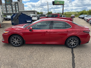 Sedán híbrido de lujo modelo 2023 con motor de 2.5 litros, transmisión automática y tracción delantera (FWD) - Product Image 4