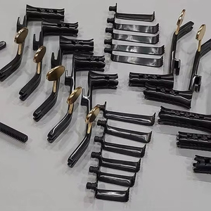 Retractor Lumbar Micro Caspar, Juego de 22 Piezas para Cirugía de Columna Vertebral, Acero Inoxidable Dorado y Negro, Retractor Lumbar Micro Caspar Manual - Product Image 1