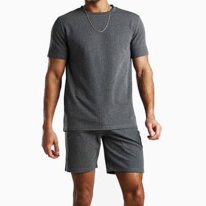 Conjunto corto de ropa de verano de secado rápido para hombres y con logotipo personalizado Patrón sólido 100% Chándales de algodón - Product Image 4