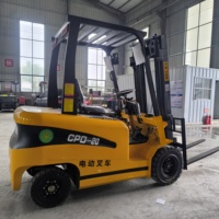 Chariot élévateur électrique compact WOMI 1,5T 2T avec batterie au plomb, mât à deux étages et pneus pleins pour la construction et l'entreposage