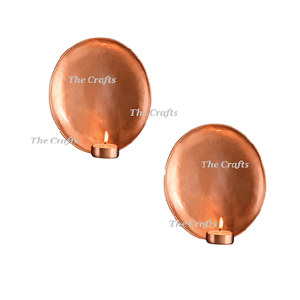 Ensemble de deux bougeoirs muraux de forme ronde en métal couleur cuivre bougeoir mural à vendre - Product Image 1