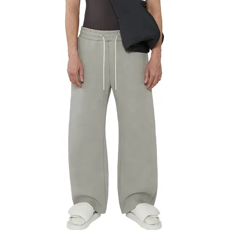 Logo personalizzato uomo essenziale streetwear francese terry pantaloni larghi larghi in pile a gamba dritta lunghi pantaloni della tuta