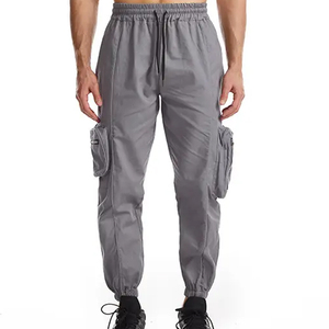 Pantalon cargo décontracté pour homme avec poches zippées et matériau réfléchissant pour la course de nuit - Product Image 1