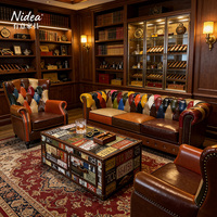 Künstlerisches Harlekin-Patchwork Chesterfield 3-Sitzer-Sofa Luxuriöse Mehrfarbige Leder-Couch mit Knopfheftung für Kreativstudios & Galerien
