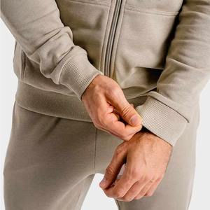 Traje de entrenamiento OEM con logotipo personalizado para hombre, respetuoso con el medio ambiente, transpirable, para correr, correr, trotar, manga larga, liso, cremallera completa, conjunto de invierno sólido - Product Image 4