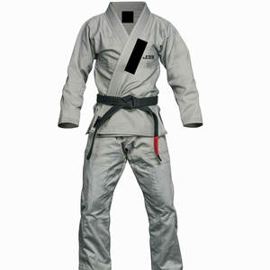 Tenues de Jiu Jitsu avec logo frontal, 100% coton, respirantes et à séchage rapide, coupe athlétique moderne, conçues pour dompter le dojo - Product Image 1