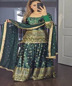 Parcourez notre collection exclusive de vêtements de mariée, avec de superbes lehengas Chinon avec des détails à volants - Product Image 1