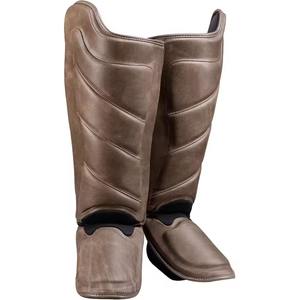 Protections de tibia professionnelles avec rembourrage en mousse haute densité, sangles ajustables à crochets et boucles, et support ergonomique pour les jambes - Product Image 4