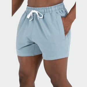 กางเกงขาสั้นเบอร์มิวดาสำหรับผู้ชายผ้าคอตตอนสีทึบเสื้อผ้าใส่เล่นยิมย้อมสีล้วนสไตล์ลำลองโลโก้ออกแบบได้ตามต้องการ - Product Image 4