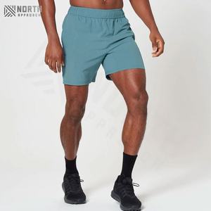 กางเกงขาสั้นผ้าโพลีเอสเตอร์สำหรับผู้ชายกางเกงออกกำลังกายเอวยางยืดแนวสตรีทสำหรับออกกำลังกายวิ่งยิมกีฬาออกกำลังกายแบบลำลอง - Product Image 5