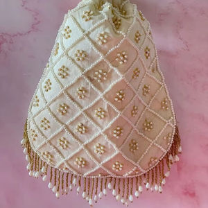 2025@Elegant <b>White</b> Potli <b>Bags</b> on Raw silk Fabric with Heavy Embellished Pearls, Crystal Glass Beads Work for Party-wear/Wedding - Product Image 1