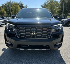 Honda Ridgeline Trail-Sport AWD 2024 d'occasion noire avec jantes en alliage foncées, sièges en cuir, transmission automatique, navigation, sièges chauffants et télécommande - Product Image 1