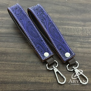 Porte-clés en cuir de vache artisanal 2025, style occidental haut de gamme, mousqueton durable, clip à clés mignon pour femmes - Product Image 1