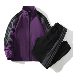 Traje deportivo para hombre, chaqueta y pantalones con cuello levantado a rayas de primavera y otoño, conjunto de dos piezas para correr y hacer ejercicio - Product Image 1