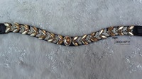 Frontlet en cuir doré orné de feuilles de cristal, accessoire élégant pour la bridonnerie et les spectacles équestres