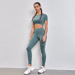 Conjunto de Yoga de alta calidad hecho a medida para mujer, ropa activa, sin costuras, transpirable, patrón sólido, cintura elástica, posicionamiento frontal del logotipo - Product Image 1