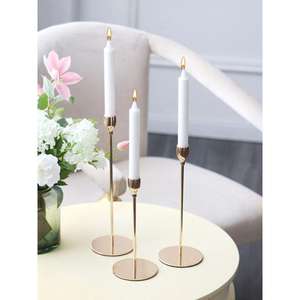 Highly decorative brass <b>candle</b> holder featuring opulent Victorian patterns and a polished <b>gold</b>-tone finished for ambiance - Product Image 2