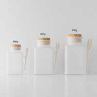 Bocaux carrés en plastique ABS mat avec couvercle en liège et cuillère en bois, contenants vides pour sels de bain, poudres et cosmétiques 100g 200g 300g