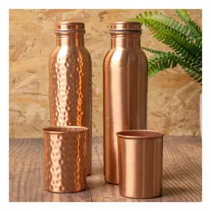 Hand Crafted Mini Pure Copper Water Bottle Drinkware And Storage Purpose At Best Price from Supplier Copper Bottles High Quality