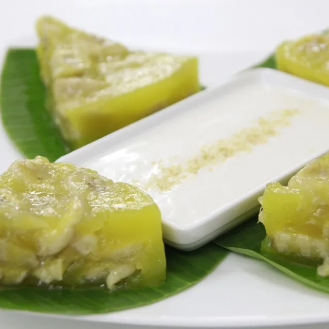 Kue pisang beku Vietnam kualitas tinggi kue uap beku pisang segar dengan susu kelapa cocok untuk microwave