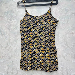 Top sin mangas acampanado con estampado floral para mujer, algodón bordado en negro y amarillo, corte regular, longitud corta - Product Image 1