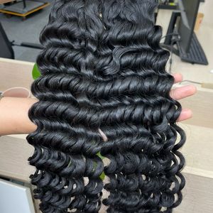 Vente en gros de cheveux ondulés vierges 100% de haute qualité Grand stock de cheveux humains bruts vietnamiens teints en trame naturelle Style ondulé - Product Image 5