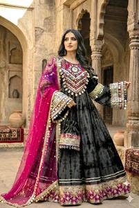 Graceful Woman Showcasing A Delicate Blush <b>Pink</b> Tie Dye Ethnic Maxi <b>Dress</b> Adorned With Exquisite Multicolor Mirror Work Patches - Product Image 2