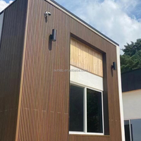 Panneau mural extérieur moderne en WPC 3D rainuré, imperméable, ignifuge et anti-insectes pour la décoration de hôtels, villas et clôtures, taille 219x20mm