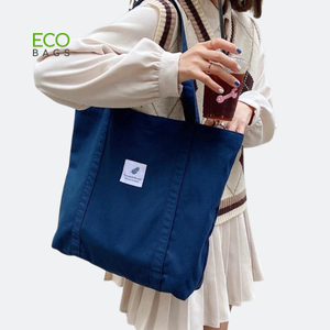กระเป๋าผ้าแคนวาสออร์แกนิคขนาดกลาง รุ่นโมเดิร์น ใช้ได้หลายแบบ เป็นมิตรกับสิ่งแวดล้อม ใช้ซ้ำได้ เหมาะสำหรับใช้เป็นของแจก ของชำร่วย หรือสะพายไหล่ - Product Image 1