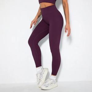 Nuevo diseño de mallas deportivas para Yoga para mujer, entrenamiento de secado rápido, alta elasticidad, colores sólidos, logotipo personalizable, mallas sin costuras - Product Image 1