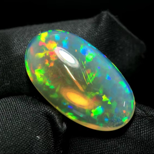 15.70 CT AAA + ethiopian welo OPAL โอปอลธรรมชาติฉูดฉาดรูปวงรีทรงหลังเบี้ยทรงรีเครื่องประดับหลวมสีขาวสำหรับวันเกิดเดือนตุลาคม - Product Image 1