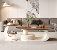 Table basse créative de style crème, ovale, pour petit appartement, style italien minimaliste, plateau en roche, table à thé