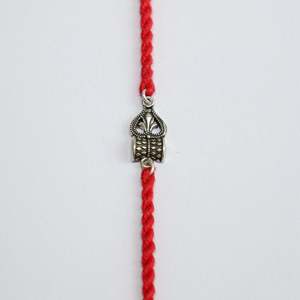 925 <b>Silver</b> Rakhi with Handmade Mahakal Trishul Religious Diamond Jewelry with Rhodium Plated Charm Pendants - Product Image 1