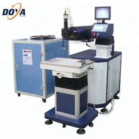 Machine de soudage laser pour la réparation de moules métalliques 200W 300W 400W avec plateforme élévatrice, machine de réparation de moules au laser à fibre
