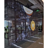 Écran LED transparent en verre pour intérieur P3.91-7.8 sur mur vidéo pour centre commercial, vitrine de magasin 4S, haute transparence