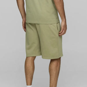 Pantalones cortos transpirables de corte holgado con logotipo bordado personalizado para hombre, pantalones cortos de estilo Hip Hop transpirables de Color sólido de longitud larga - Product Image 3