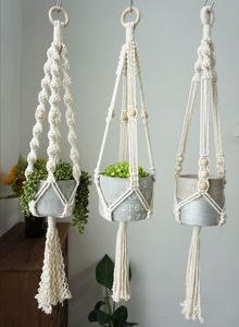 Jardinière en corde macramé faite à la main pour la décoration de la maison, avec une technique de nouage traditionnelle et un style bohème moderne - Product Image 4