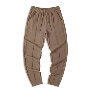 Pantalones de chándal cónicos ajustados informales para hombre, pantalones con cordón texturizado de punto acanalado elástico ligero con bolsillos, Material de tela - Product Image 3