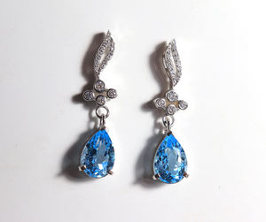 ต่างหูพลอยบลูโทแพซแท้จากสวิสเซอร์แลนด์ รูปทรงลูกแพร์ ขนาด 10x7 มม. ขัดเงาอย่างดี ของขวัญสำหรับเธอ - Product Image 5