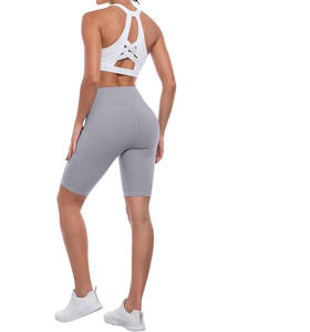 Pantalones cortos de Yoga de cintura alta de 3 pulgadas para mujer con control de barriga Patrón sólido Entrenamiento Atlético Pantalones cortos para correr Bolsillos profundos-Venta al por mayor - Product Image 6