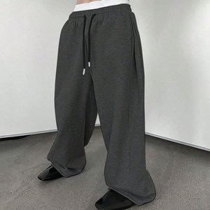 กางเกงวอร์มขายส่งคุณภาพเยี่ยมสำหรับผู้ชาย ทรงขากว้าง สไตล์แบ็กกี้ จ็อกเกอร์ เอวยางยืด ใส่สบาย ระบายอากาศได้ดี ผลิตจากผ้าสแปนเด็กซ์/คอตตอน ดีไซน์โดดเด่น - Product Image 1