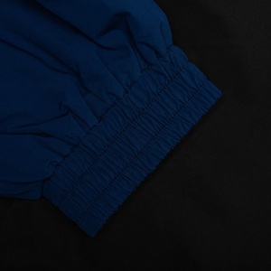 แจ็กเก็ตกันลมกันน้ำน้ำหนักเบาสำหรับผู้ชายผู้หญิงเสื้อโค้ทไนล่อนพับเก็บได้ระบายอากาศได้สำหรับกีฬากลางแจ้งโลโก้ตามต้องการ - Product Image 5