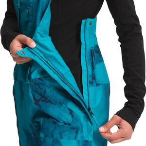 Baberos de esquí personalizados para mujer Pantalones de nieve con aislamiento impermeable con impresión de logotipo y servicio OEM ODM para deportes de invierno al aire libre - Product Image 2