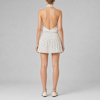Robe d'été mini blanche à pois dos nu et col halter sans manches pour femme, idéale pour les brunches - Fabricant
