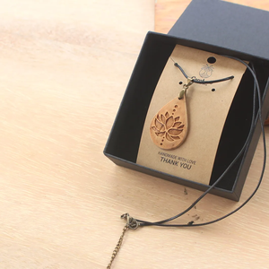 Coconut Shell Teardrop Necklace with <b>Lotus</b> Design - Handmade & Eco-Friendly | Viet Fargimex - Product Image 3